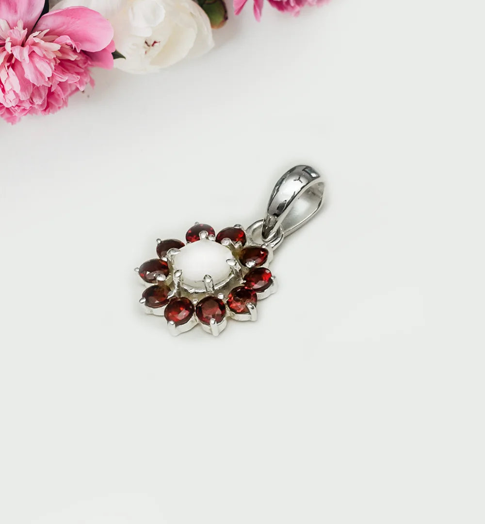 Mohnaa Flower Pendant With Garnet Gemstone In Fine Sterling Silver